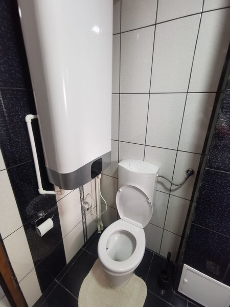 Nehoiu, centru, strada N. Costache, bloc A6, ap. 2, parter.